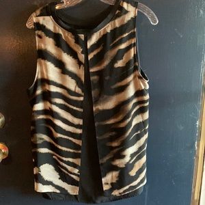 Cute flowy ladies top animal print attached over black tank. Barely worn.